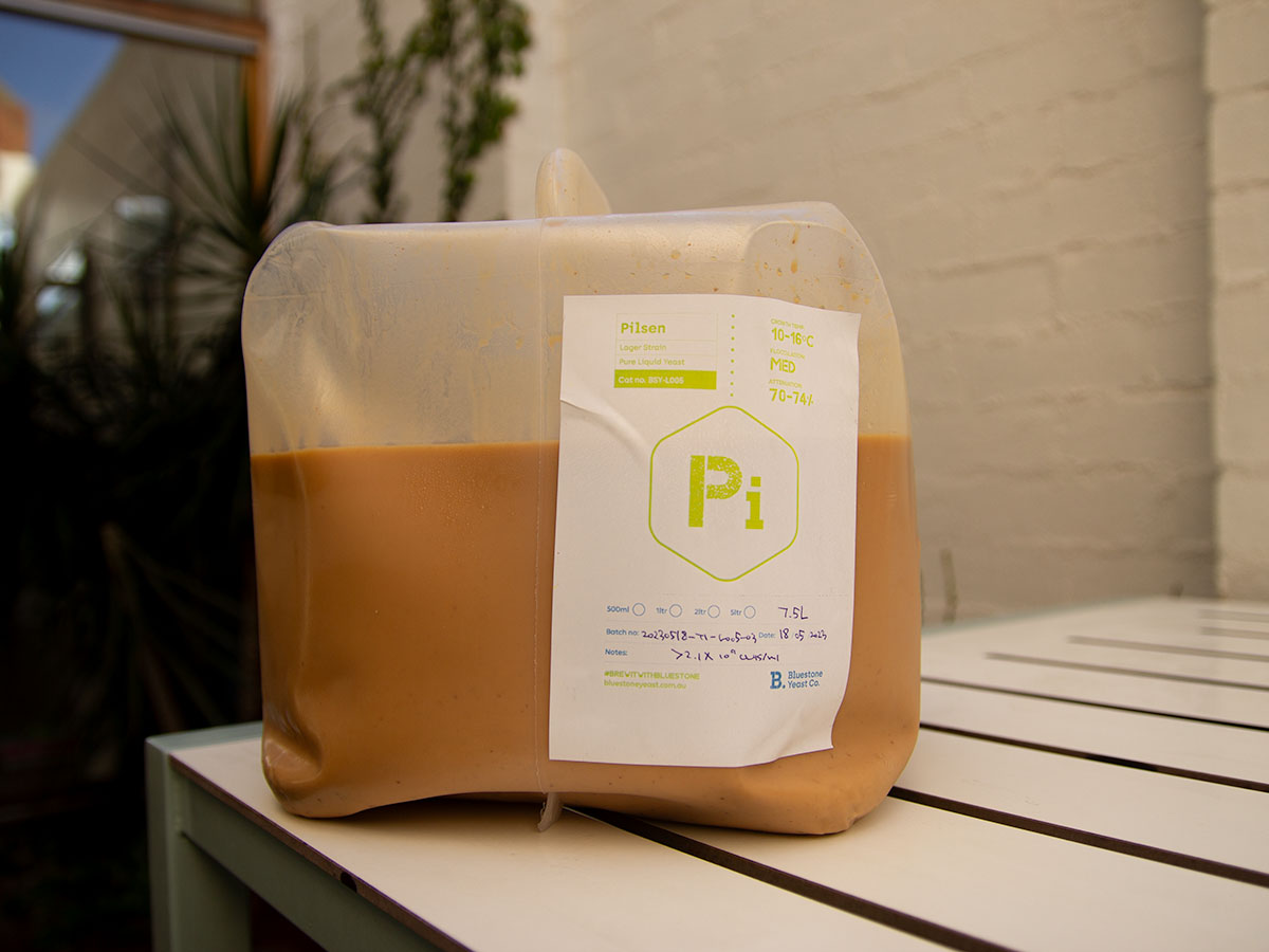 Container of liquid yeast on a table
