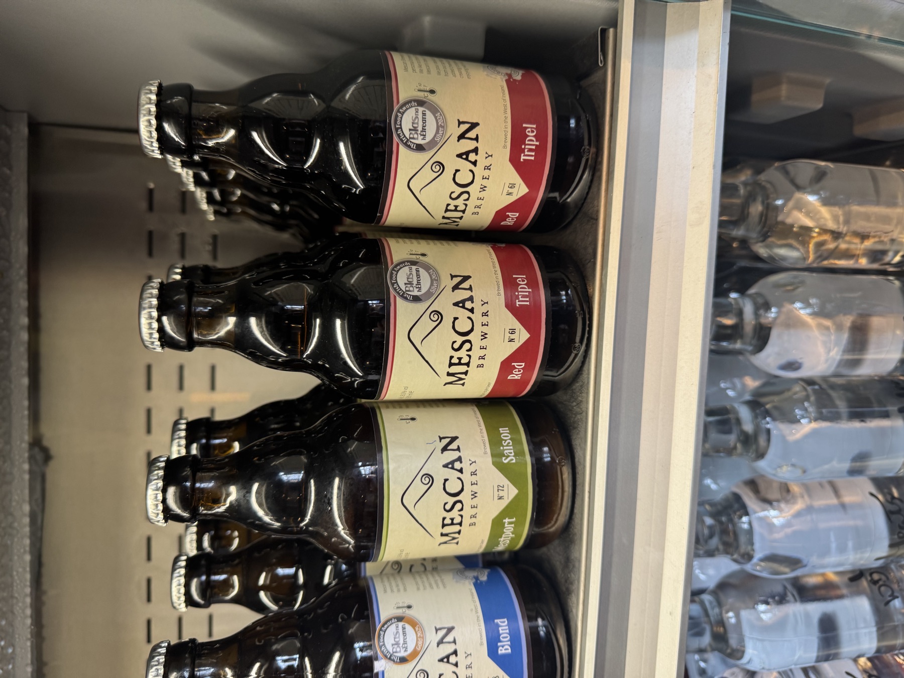 Mescan bottles carrying Blas na hÉireann award stickers