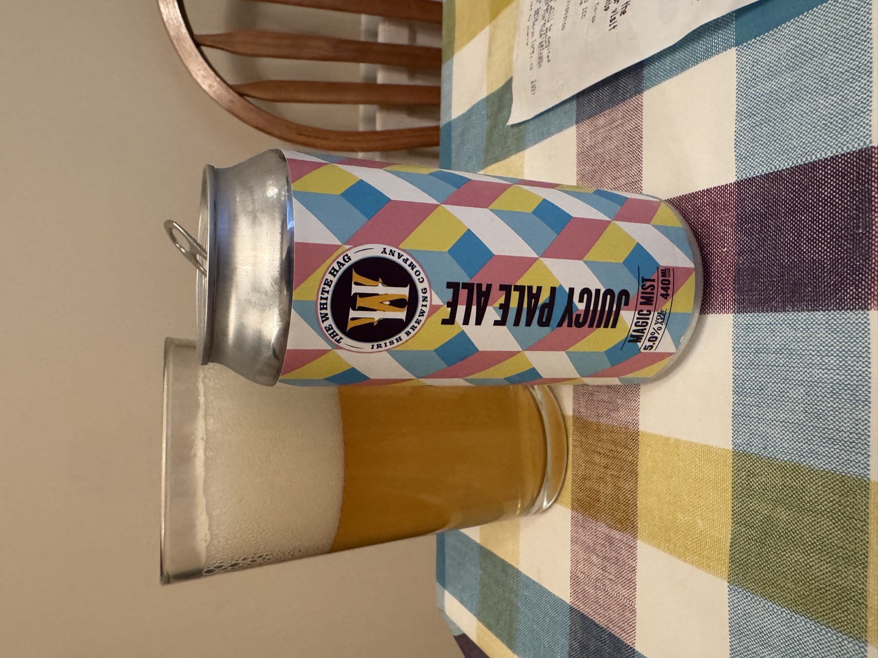 The White Hag Magic Mist can beside a poured glass